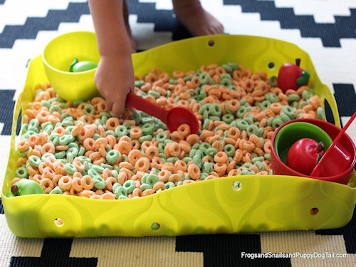 http://www.frogsandsnailsandpuppydogtail.com/2014/09/edible-apple-sensory-bin.html